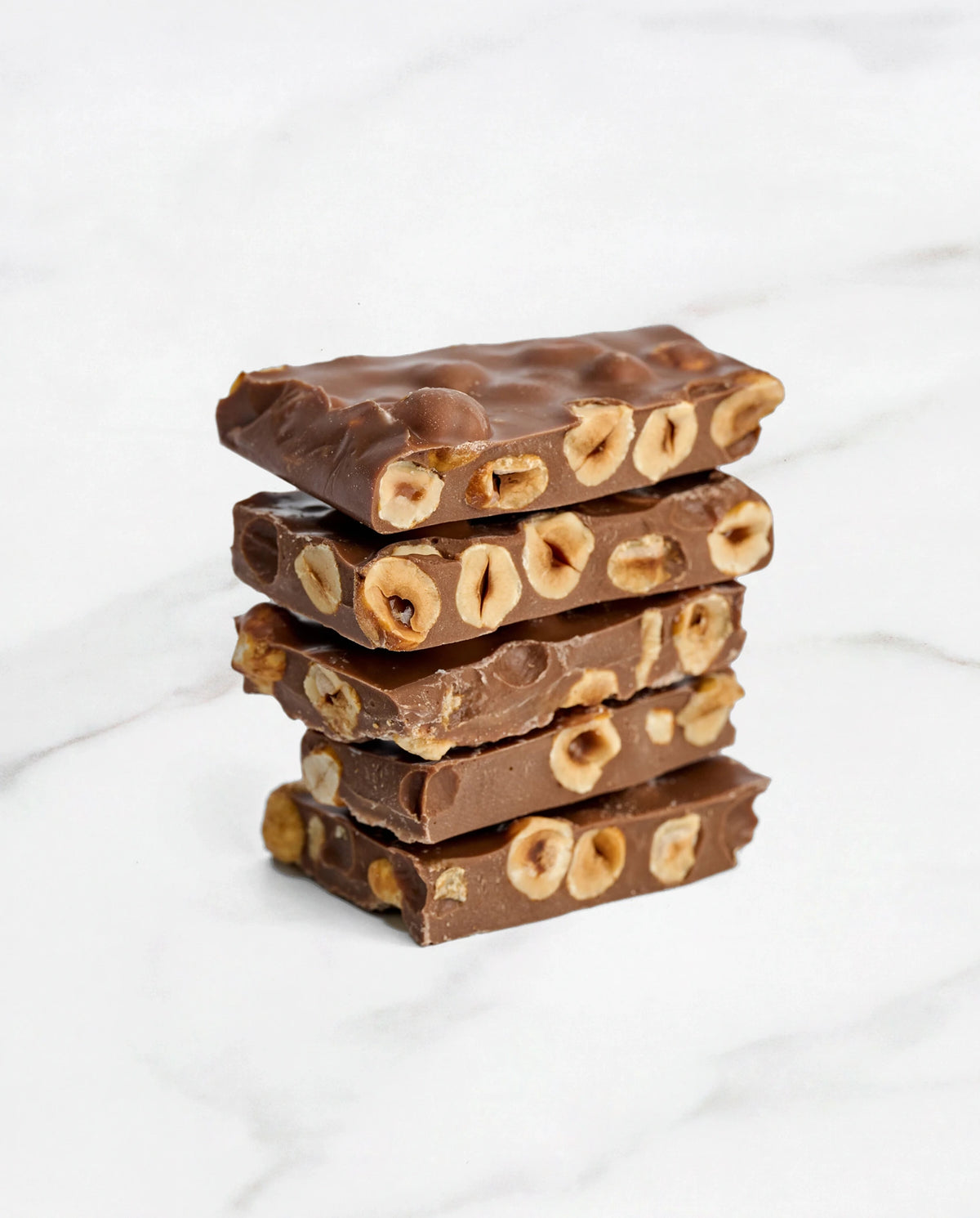 Melkchocoladebrokken met hazelnoten