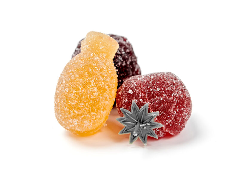 These yellow, red and purple fruit sweets are called 'pâtes de fruits'. These fruit cubes come in different shapes, colours and flavours.