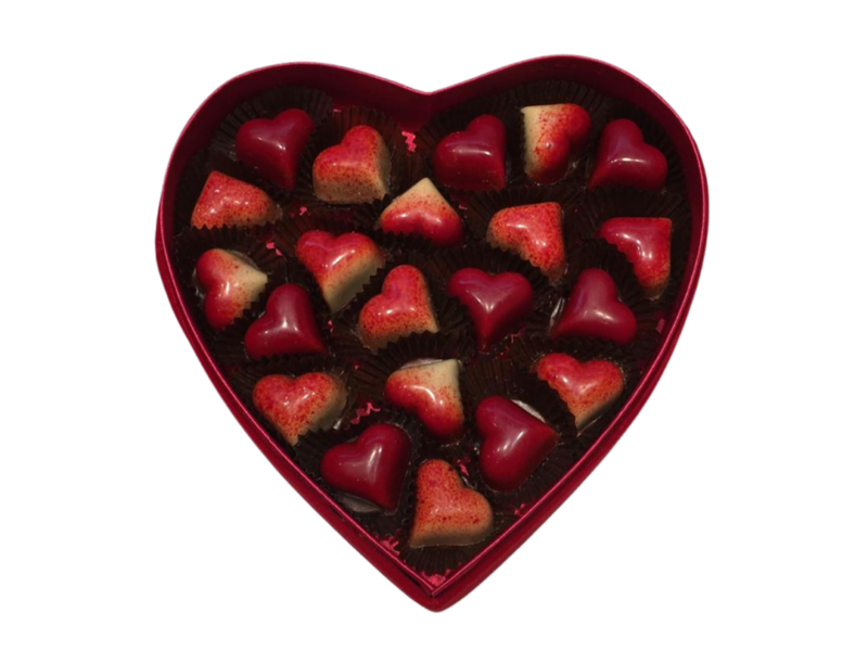 Vous cherchez un box de chocolat pour Saint Valentin ? Cette boîte en forme de cœur de velours rouge est remplie de délicieux pralines.
